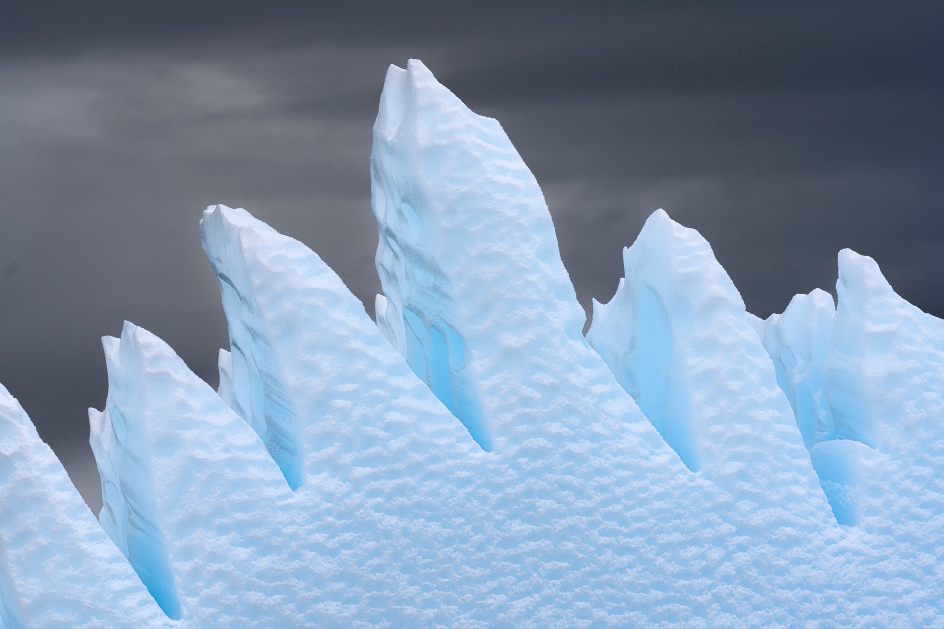 Satellite Study of 15,000 Antarctic Ice Cliffs Finds Rapid Retreat Followed by Stabilization
